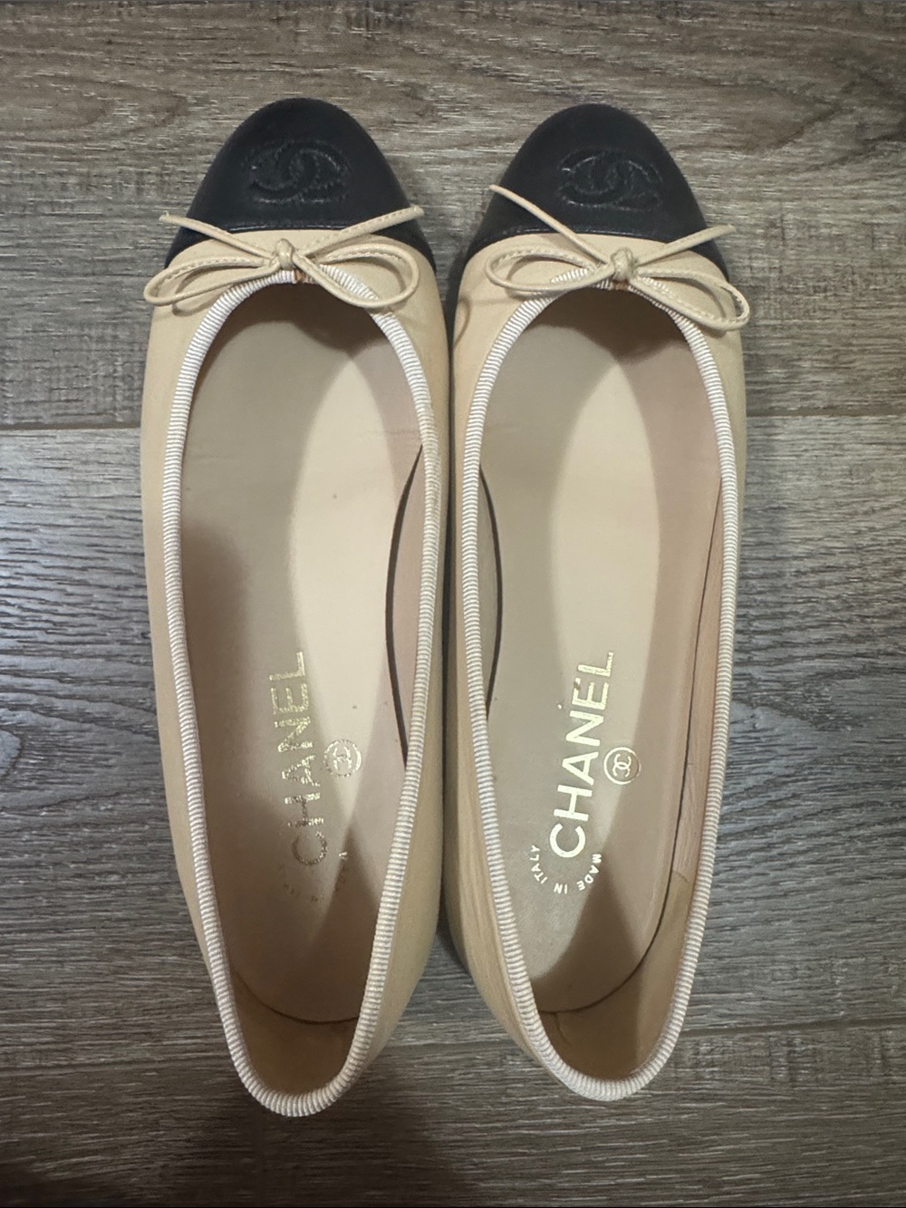 CHANEL Beige and Black Cap-Toe Ballet Flats